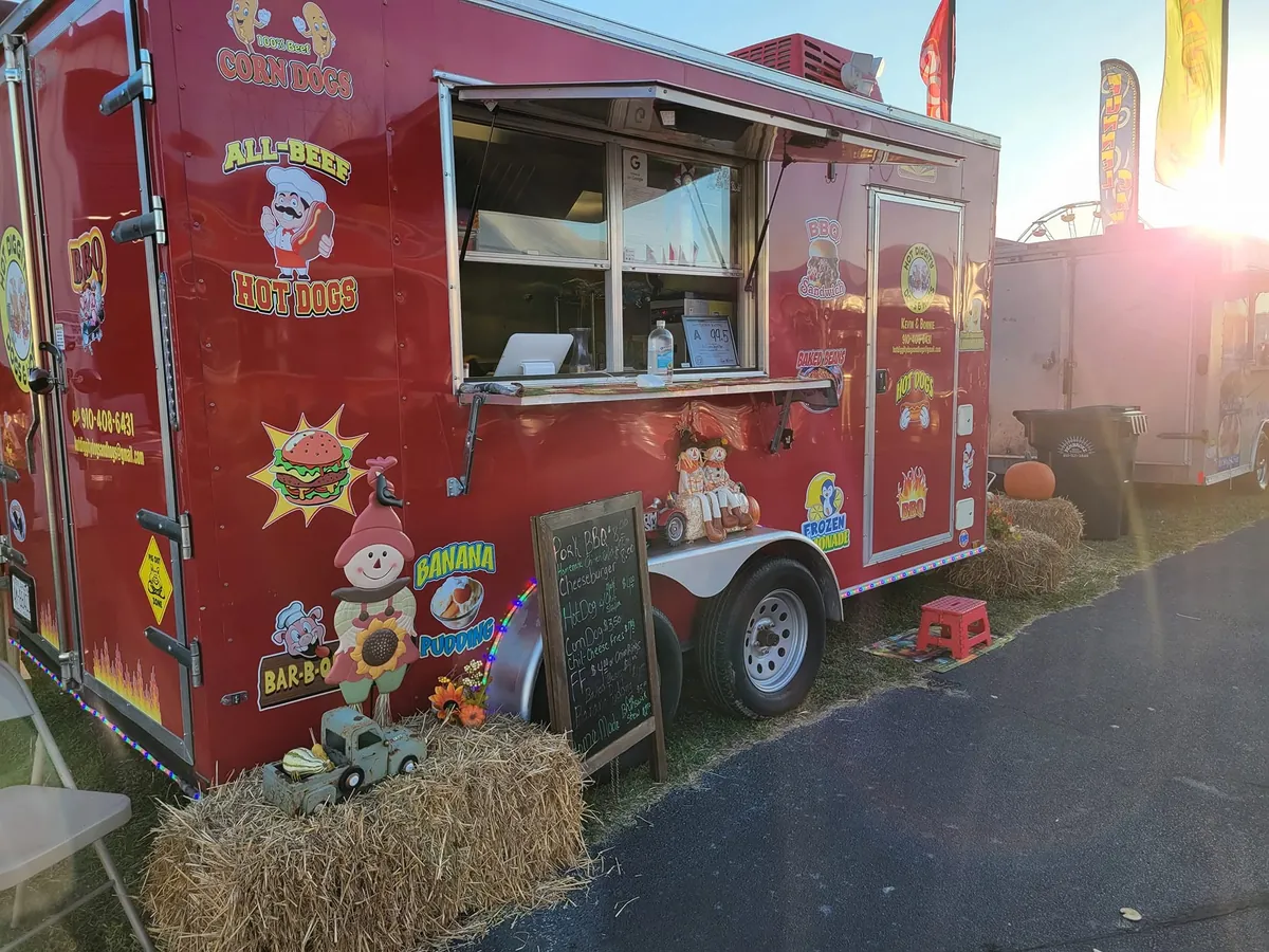 The trailer set up at a fall event with the serving window open